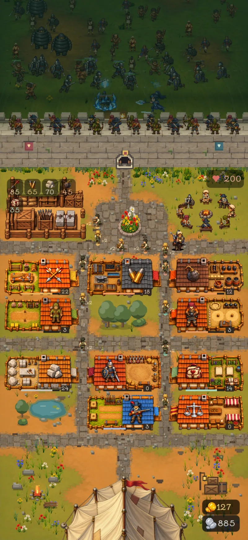 Workshops, carriers and a central stockpile keep the settlement and its defenders supplied.
